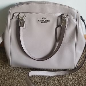 Convertible Coach  crossbody bag in champagne color